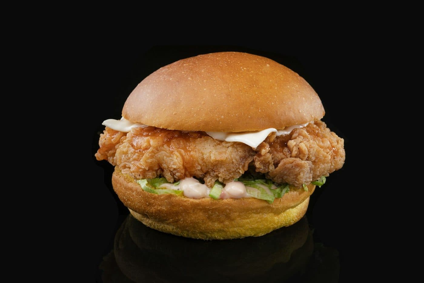 Burger poisson : Filet de poisson, cheddar, salade, tomate